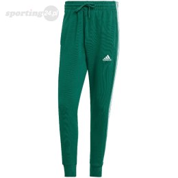 Spodnie męskie adidas Essentials French Terry Tapered Cuff 3-Stripes zielone IS1392 Adidas